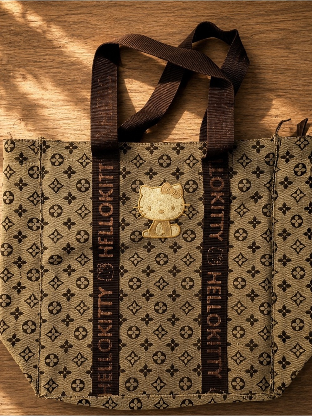 Hello Kitty Brown Canvas Patterned Tote with Gold Emblem